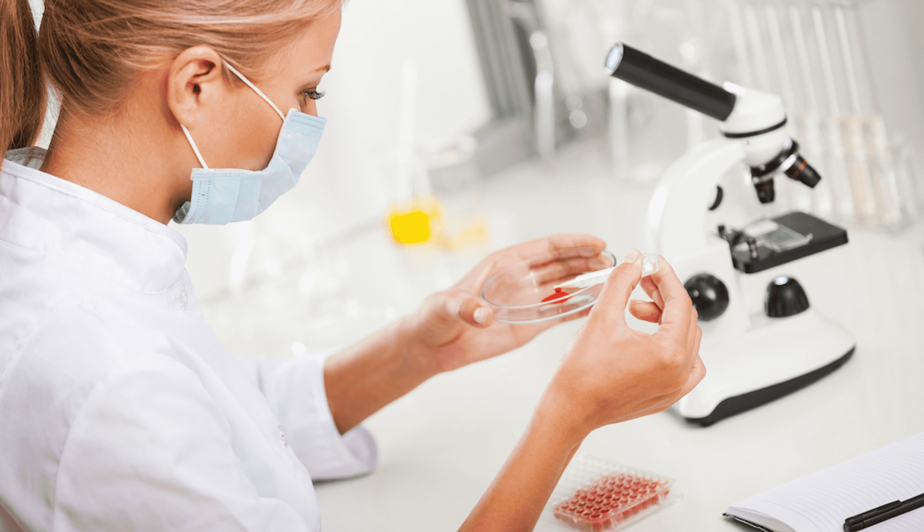 A Lab Technician Analyzing A Blood Sample